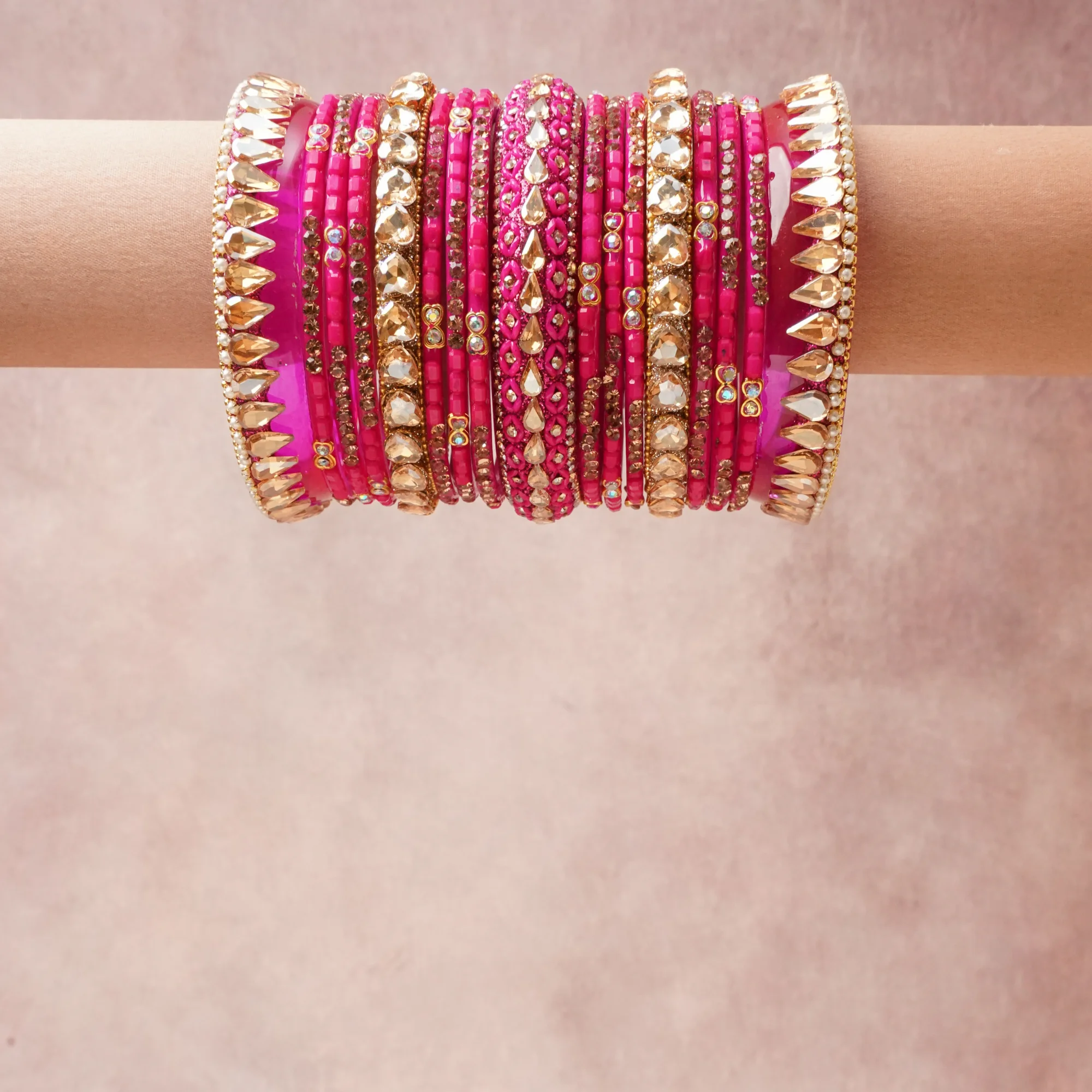 A commanding Fuchsia anchors this beautiful set, enriched with accents of Gold, Champagne that add depth and dimension.

Featuring a striking composition of Lacquered Resin, Glass, Gold-toned Metal, Crystal, this set carries intricate craftsmanship and strong presence. Grand in form, it is created for moments that deserve to be marked.